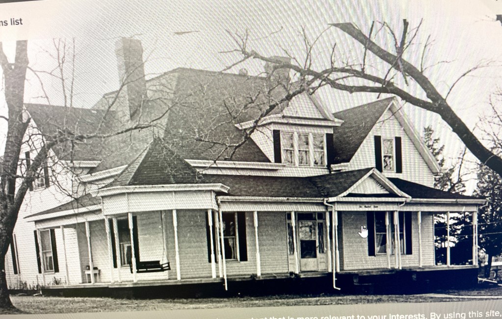 Historic Queen Anne Victorian house, known as the Oscar G. Smith House, featuring grand porches and intricate woodwork.